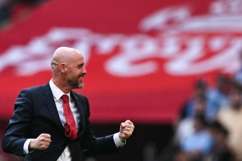Manchester United manager Erik ten Hag celebrates winning the FA Cup