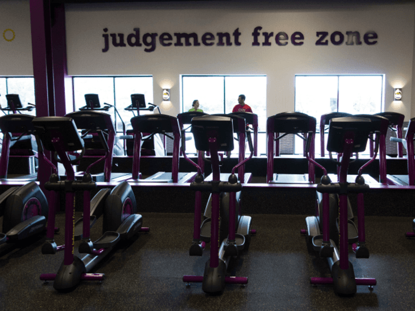 People exercise at Planet Fitness in the Columbia Mall on July 24, 2017 in Bloomsburg, Pen