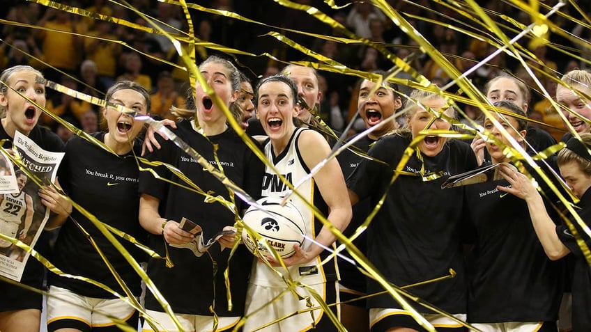 Caitlin Clark and teammates celebrate record