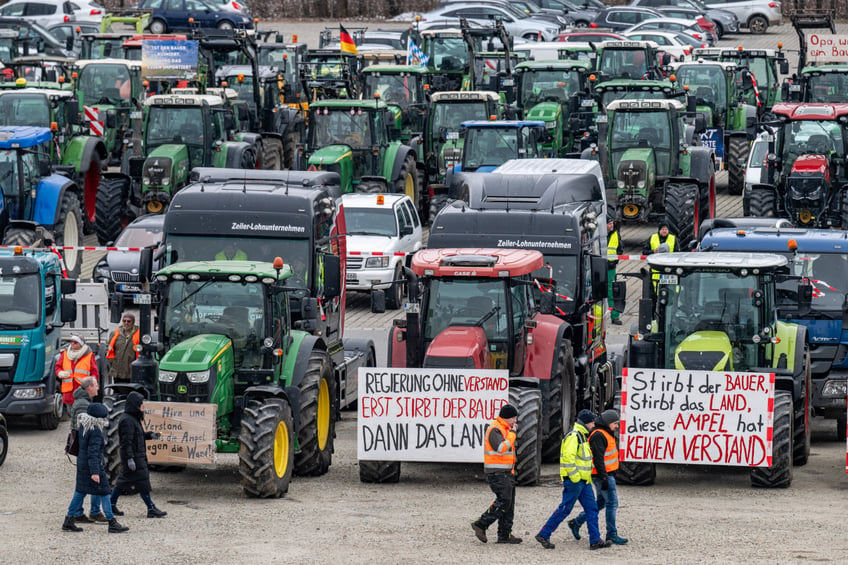 08 January 2024, Bavaria, Straubing: Tractors are parked at the Am Hagen parking lot during a demonstration by farmers. In response to the federal government's austerity plans, the farmers' association has called for a week of action with rallies and rallies starting on January 8. It is to culminate in a major demonstration in the capital on January 15. Photo: Armin Weigel/dpa (Photo by Armin Weigel/picture alliance via Getty Images)