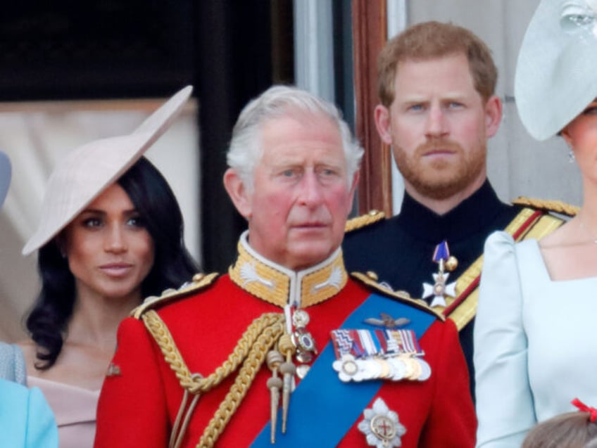 LONDON, UNITED KINGDOM - JUNE 09: (EMBARGOED FOR PUBLICATION IN UK NEWSPAPERS UNTIL 24 HOURS AFTER CREATE DATE AND TIME) Meghan, Duchess of Sussex, Prince Charles, Prince of Wales and Prince Harry, Duke of Sussex stand on the balcony of Buckingham Palace during Trooping The Colour 2018 on June 9, …