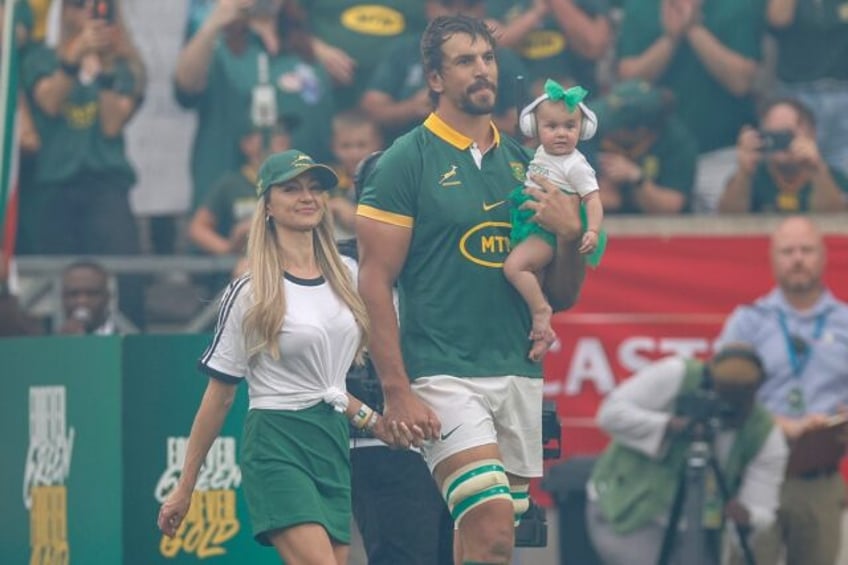 South Africa lock Eben Etzebeth walks on to the Mbombela Stadium pitch accompanied by his