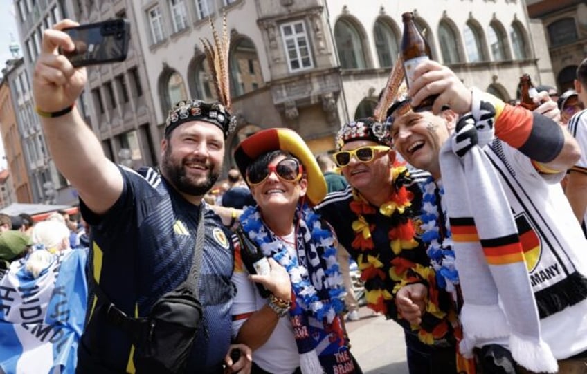 Fans of Germany and Scotland party together in Munich