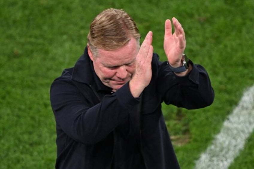 Netherlands coach Ronald Koeman applauds his team's supporters after Wednesday's Euro 2024