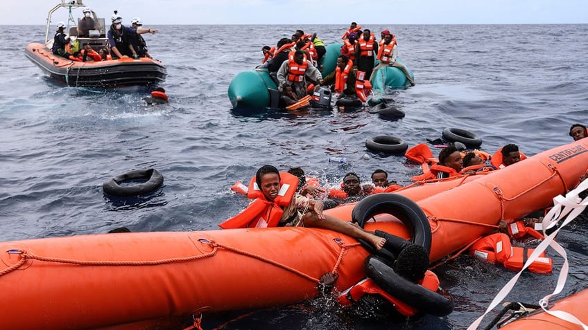 Migrants aboard a rubber boat