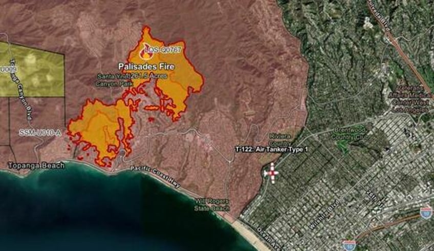 evacuate now fire tears through upscale pacific palisades in los angeles