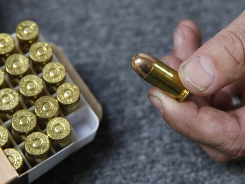 California Ammo Background Checks In this June 11, 2019, file photo, Chris Puehse, owner of Foothill Ammo, displays .45-caliber ammunition for sale at his store in Shingle Springs, Calif. A federal judge on Thursday, April 23, 2020, blocked a California law requiring background checks for people buying ammunition, ruling the …