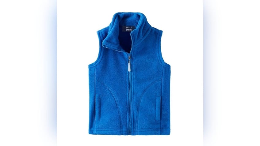 Pull together the outfit with a blue vest. 