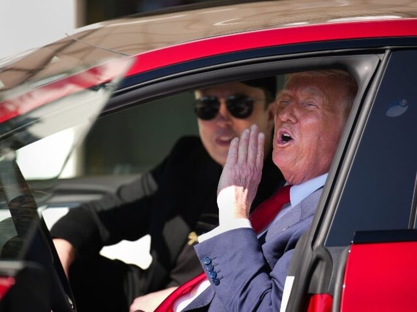 Donald Trump and Elon Musk in the president's new Tesla