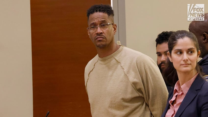 Sheldon Johnson appears in a courtroom at the Bronx Supreme Court