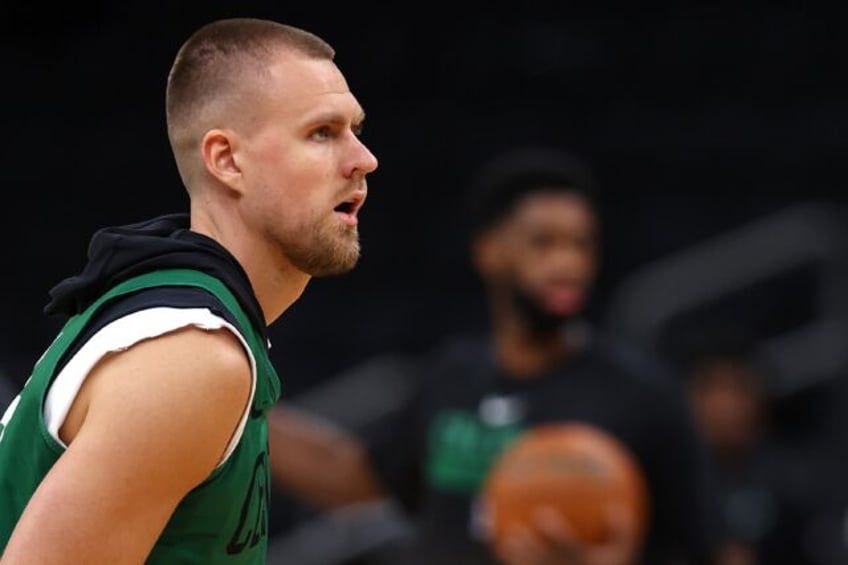 Kristaps Porzingis of the Boston Celtics practices on the eve of the opening game of the N