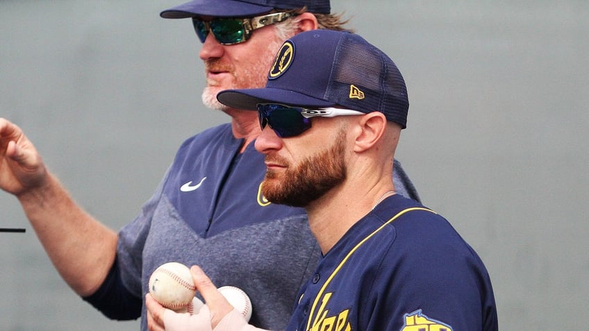 Jonathan Lucroy looks on