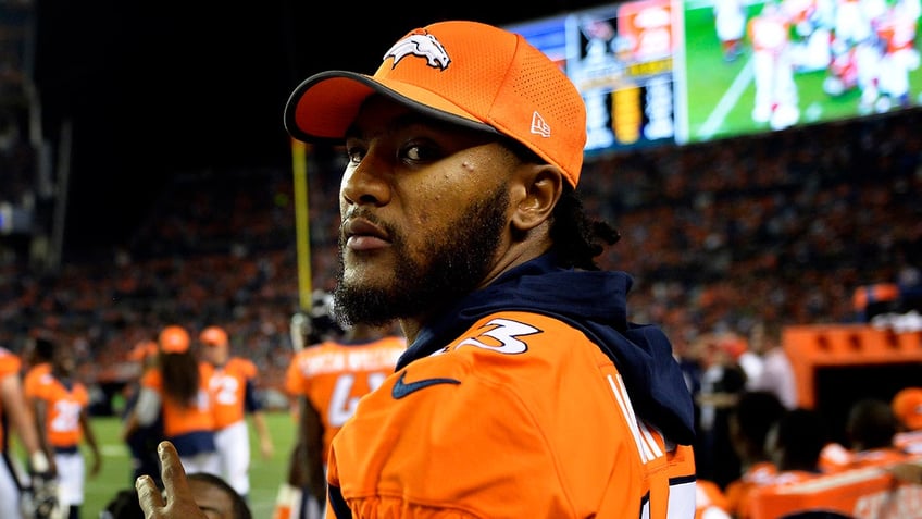 T.J. Ward looks on sideline