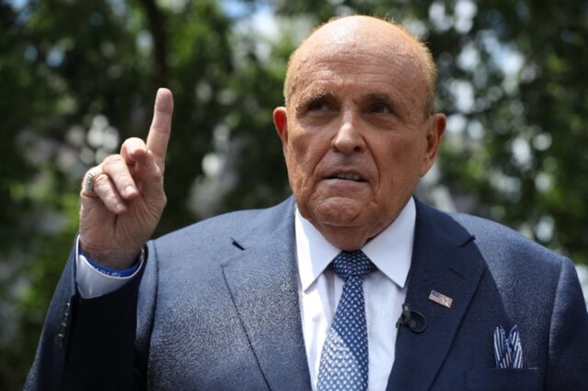 Former New York mayor Rudy Giuliani has been held in contempt of court by a federal judge