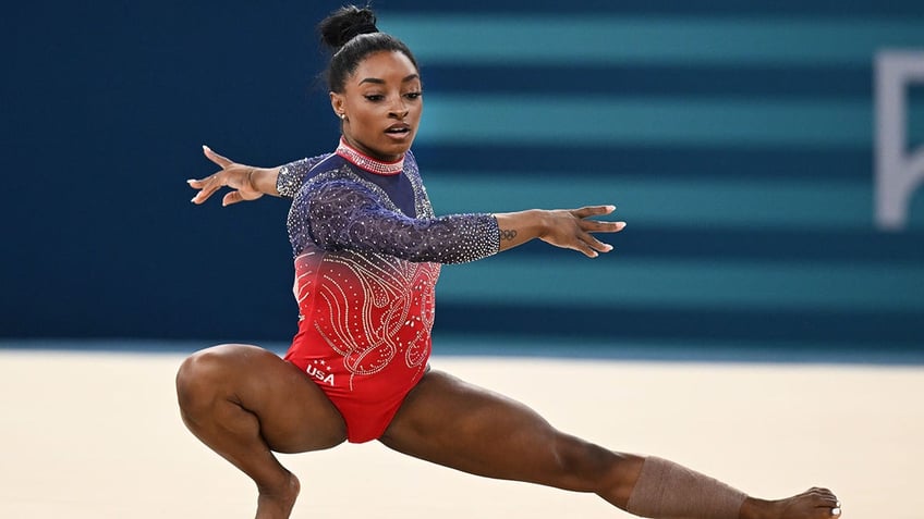 Simone Biles on the floor