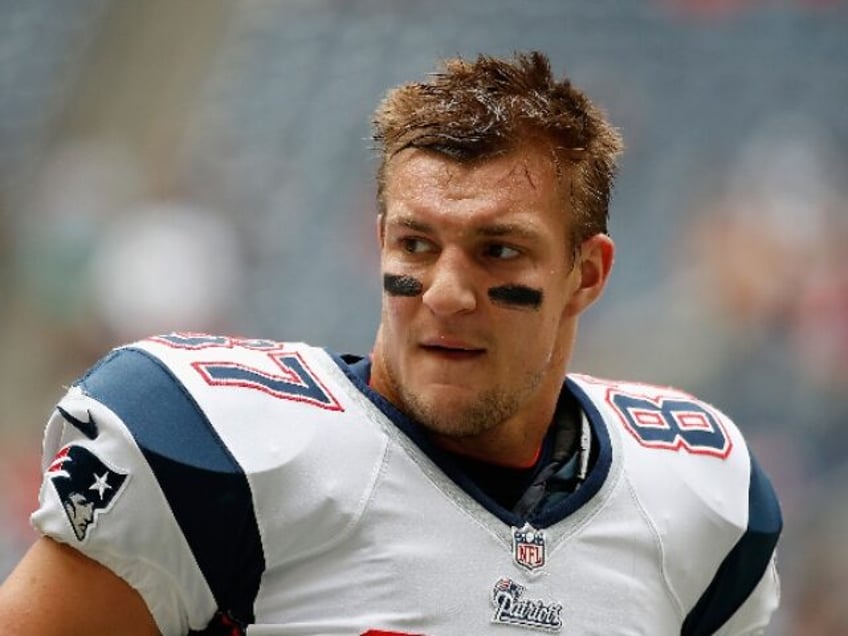 Tom Brady #12 of the New England Patriots drops back to pass during the first half of the game against the Houston Texans at Reliant Stadium on December 1, 2013 in Houston, Texas. *** Local Caption *** Tom Brady