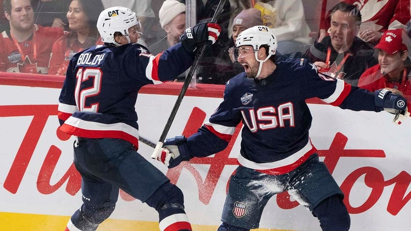 Dylan Larkin and Matt Boldy celebrate