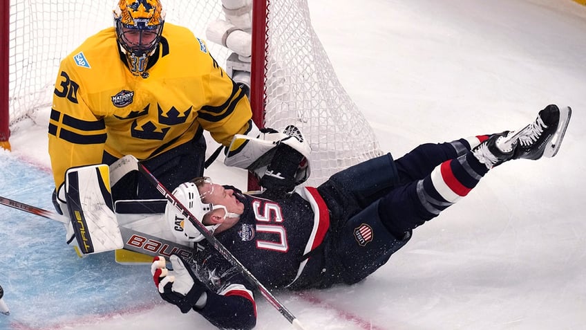 Brady Tkachuk and Samuel Ersson