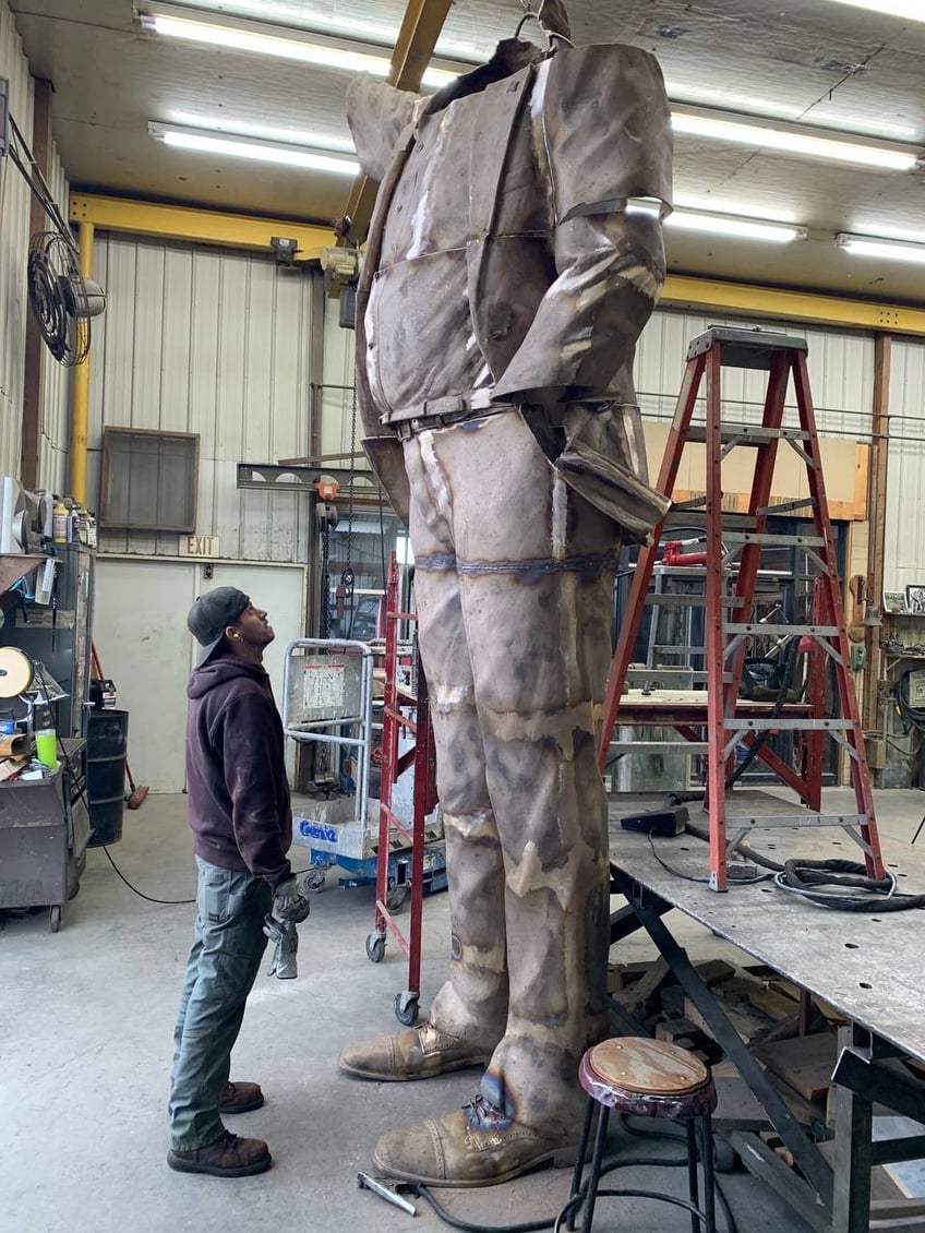 exclusive a two story trump statue drawing on his iconic defiance post assassination attempt is under construction