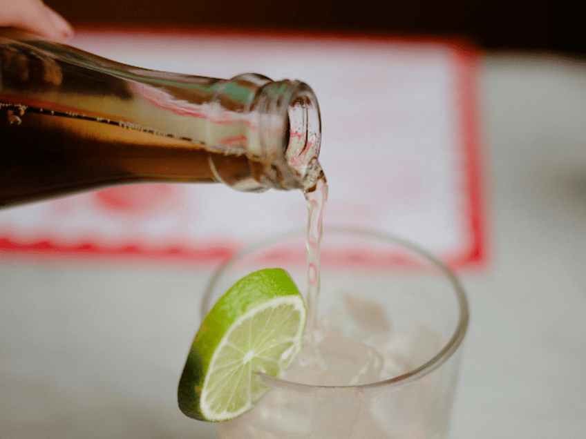 pouring drink from a bottle