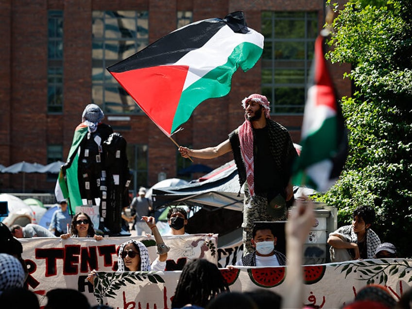 WASHINGTON, DC - MAY 02: Pro-Palestinian protesters demonstrate on the campus of George Wa