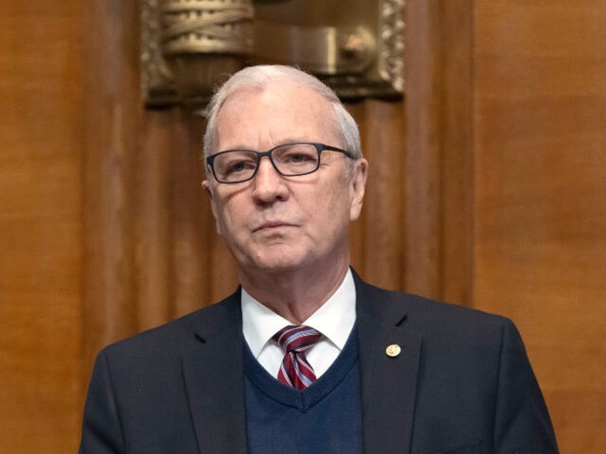 Sen. John Curtis, R-Utah, left, and Sen. Kevin Cramer, R-N.D., right, stand before a heari