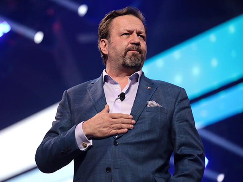 Sebastian Gorka speaking with attendees at the 2021 AmericaFest at the Phoenix Convention