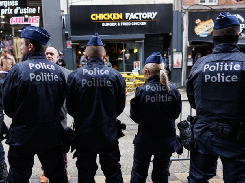 Belgian Police block the entrance of the Claridge hotel in Brussesl where is held the "Nat