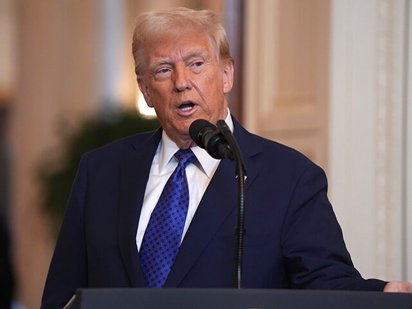 President Donald Trump speaks before signing the Laken Riley Act in the East Room of the W