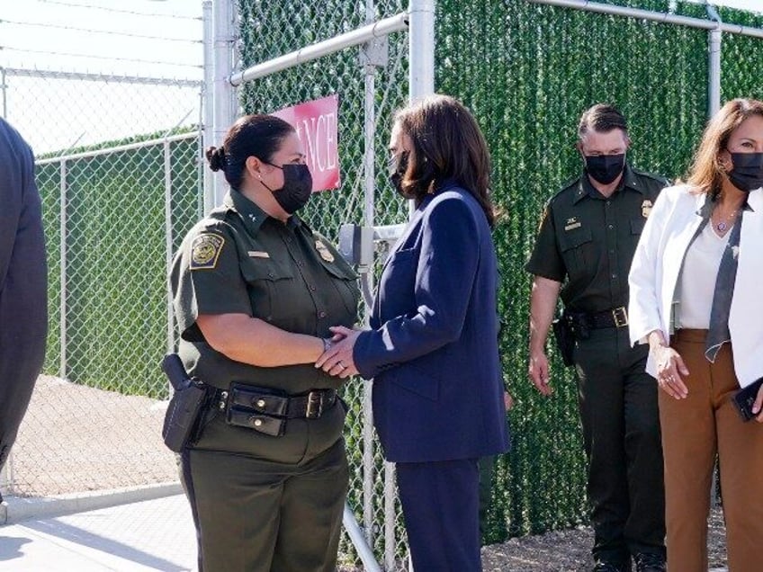 FILE - Vice President Kamala Harris talks to Gloria Chavez, Chief Patrol Agent of the El P