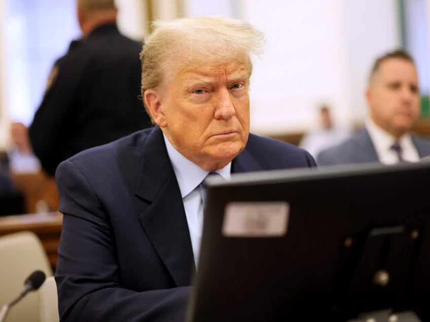 NEW YORK, NEW YORK - OCTOBER 18: Former President Donald Trump sits in the courtroom durin