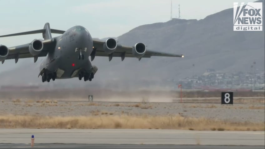 military plane taking off