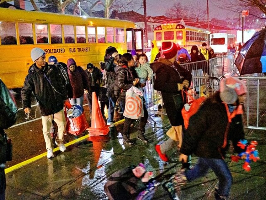 UNITED STATES -January 9: Migrants evacuated from Floyd Bennett Field arrive at James Madison High School on Bedford Avenue in Brooklyn, New York City during a storm on Tuesday, January 9, 2024. (Photo by Gardiner Anderson for NY Daily News via Getty Images)