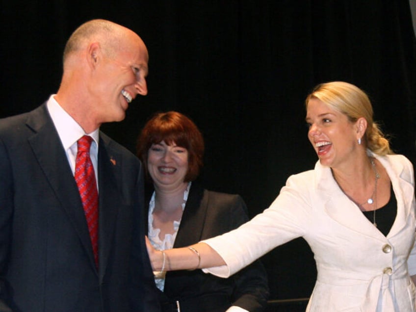 Rick Scott and Pam Bondi