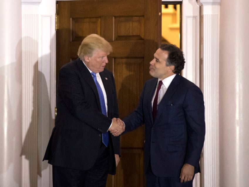 BEDMINSTER TOWNSHIP, NJ - NOVEMBER 20: (L to R) President-elect Donald Trump shakes hands with David McCormick, president of the management committee at Bridgewater Associates, following to their meeting at Trump International Golf Club, November 20, 2016 in Bedminster Township, New Jersey. Trump and his transition team are in the process of filling cabinet and other high level positions for the new administration. (Photo by Drew Angerer/Getty Images)