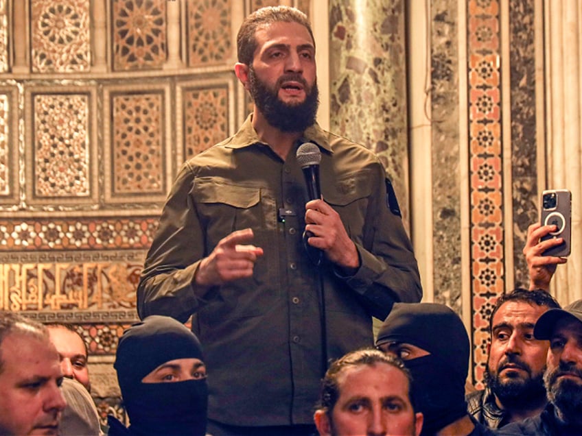 FILE - Ahmed al-Sharaa, also known by nom de guerre Abu Mohammed al-Golani, speaks at the Umayyad Mosque in Damascus, Syria, Sunday, Dec. 8, 2024. (AP Photo/Omar Albam, File)