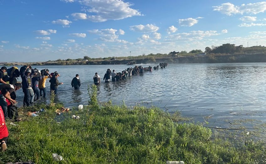 exclusive photos up to 3k migrants poised to cross into texas border town