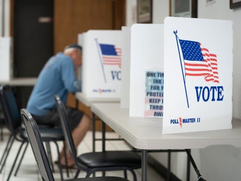 MT. GILEAD, NC - MAY 17: A man fills out a ballot at a voting booth on May 17, 2022 in Mt.