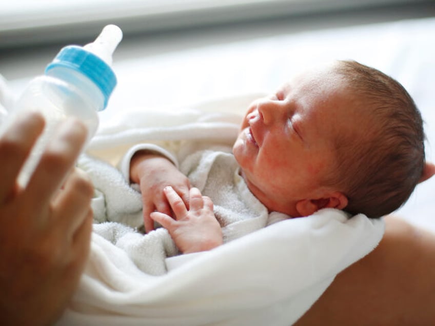 baby with bottle