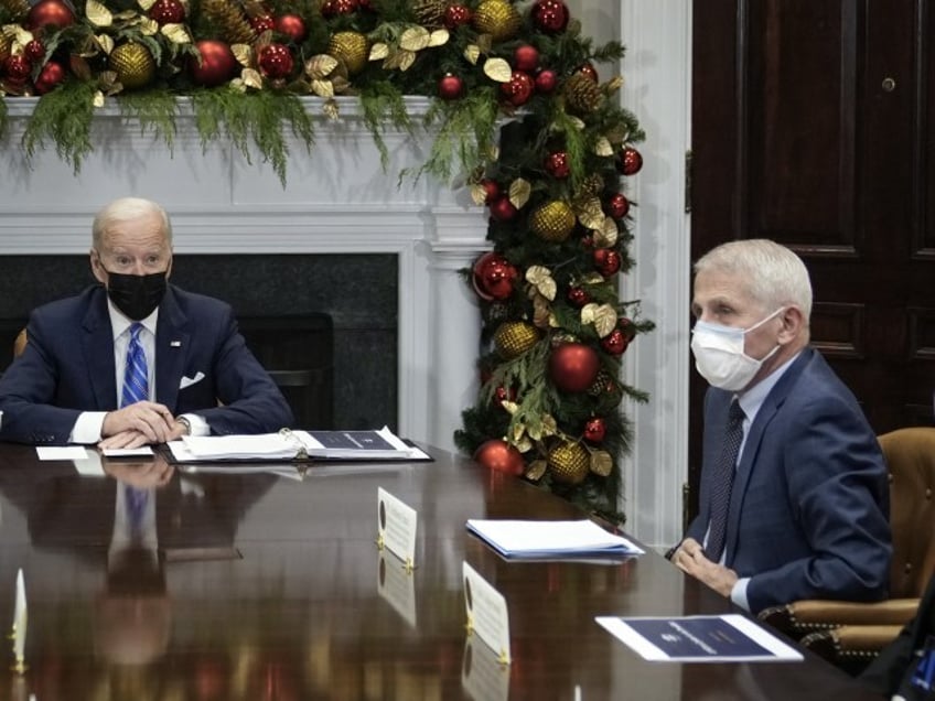 WASHINGTON, DC - DECEMBER 16: U.S. President Joe Biden speaks during a meeting with the White House COVID-19 Response Team, including National Institute of Allergy and Infectious Diseases Director Anthony Fauci (R), in the Roosevelt Room of the White House December 16, 2021, in Washington, DC. Biden made a brief statement to the press regarding the Omicron variant of the coronavirus.