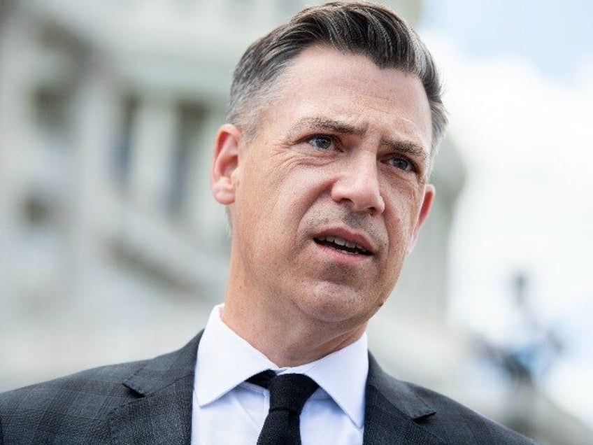 Rep. Jim Banks, R-Ind., talks with reporters on the House steps of the Capitol on Thursday