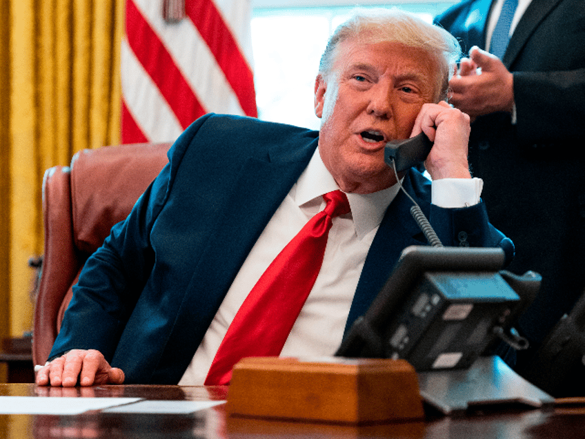 US President Donald Trump speaks to the leaders of Sudan and Israel as he announces that Sudan will normalize relations with Israel at the White House in Washington, DC, on October 23, 2020. - "Sudan and Israel have agreed to the normalization of relations -- another major step toward building peace in the Middle East with another nation joining the Abraham Accords," Trump said. (Photo by ALEX EDELMAN / AFP) (Photo by ALEX EDELMAN/AFP via Getty Images)