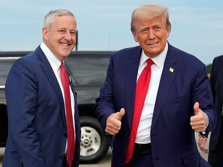 Republican presidential nominee former President Donald Trump stands with Republican Natio