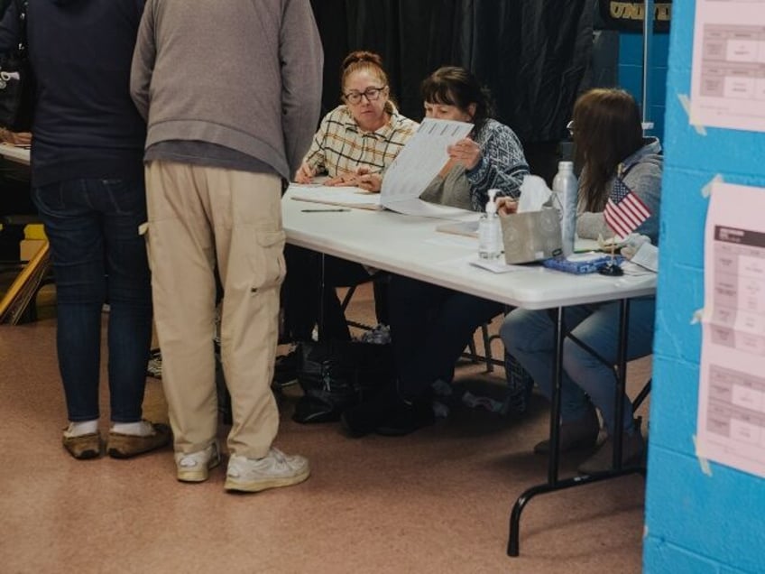 Voters and election officials at a polling location in Philadelphia, Pennsylvania, US, on Tuesday, Nov. 8, 2022. After months of talk about reproductive rights, threats to democracy, climate change, immigration and crime, the US midterm elections are coming down to the way Americans feel about the overall state of the …