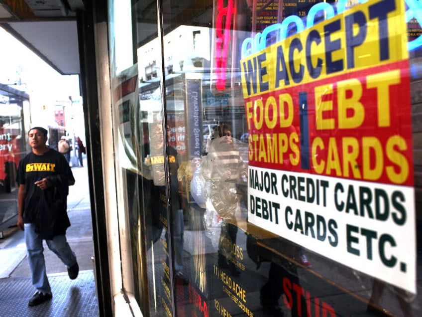 A sign in a market window advertises the acceptance of food stamps on October 7, 2010 in N