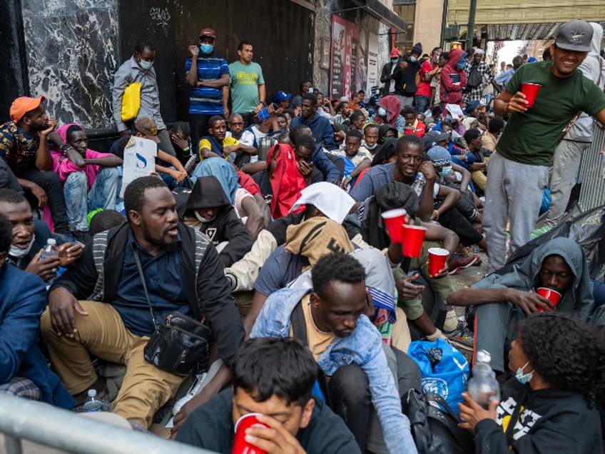 NEW YORK, NEW YORK - AUGUST 01: Dozens of recently arrived migrants to New York City camp outside of the Roosevelt Hotel, which has been made into a reception center, as they try to secure temporary housing on August 01, 2023 in New York City. The migrants, many from Central America and Africa, have been sleeping on the streets or at other shelters as the city continues to struggle with the influx of migrants whose numbers have surged this spring and summer. (Photo by Spencer Platt/Getty Images)