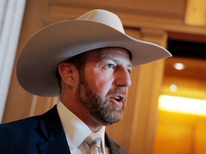 WASHINGTON, DC - MARCH 13: U.S. Sen. Markwayne Mullin (R-OK) speaks to reporters outside o