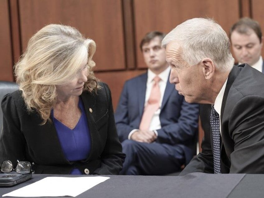 Sen. Marsha Blackburn (R-TN) left, talks with Sen. Thom Tillis (R-NC) before a Senate Judiciary Oversight of the Federal Bureau of Prisons hearing on Capitol Hill, Wednesday, Sept. 13, 2023, in Washington. (Mariam Zuhaib/AP)