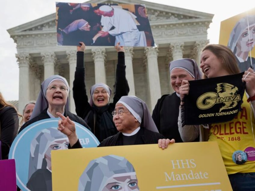 Nuns with the Little Sisters of The Poor, including Sister Celestine, left, and Sister Jea