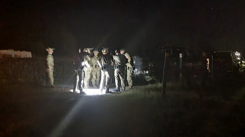 DPS troopers, Texas National Guard soldiers, and Border Patrol agents prepare to search for the migrants attempting to avoid apprehension. (Bob Price/Breitbart Texas)